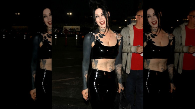 Kat Von D with blackout tattoo sleeves