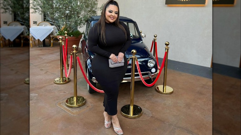 Black maxi dress, silver sandals