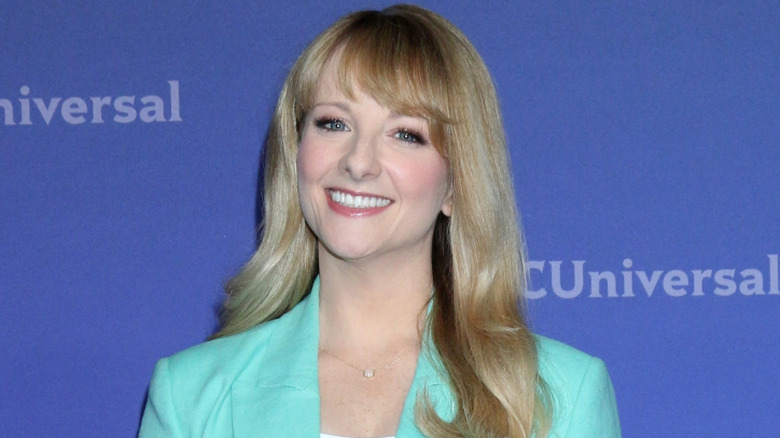 Melissa Rauch wearing a blue jacket
