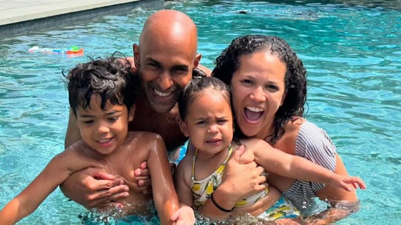 Laura Jarrett smiles on vacation with her husband and two children