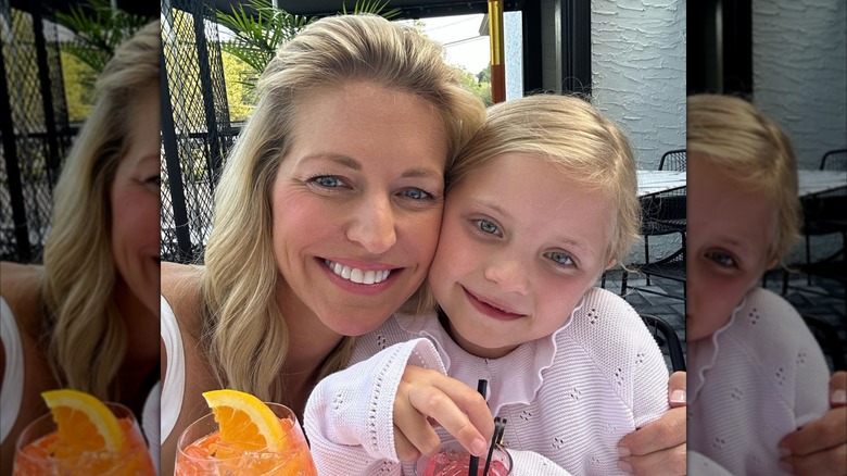 Fox News host Ainsley Earhardt smiling with her daughter while makeup-free
