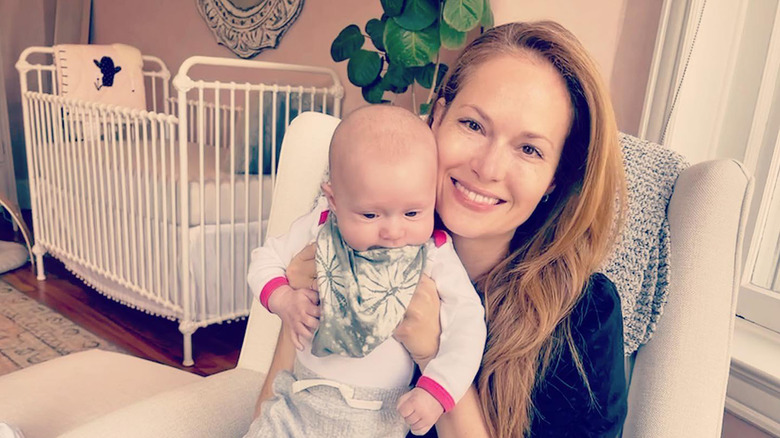 Fox News host Gillian Turner smiling with her daughter while makeup-free