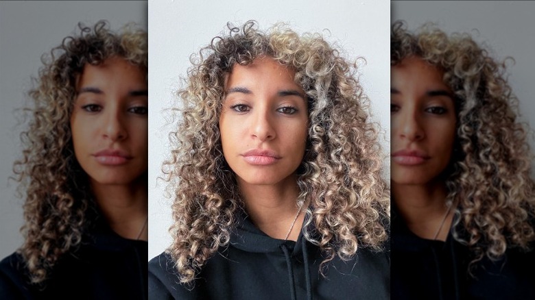 butterfly haircut with curly hair