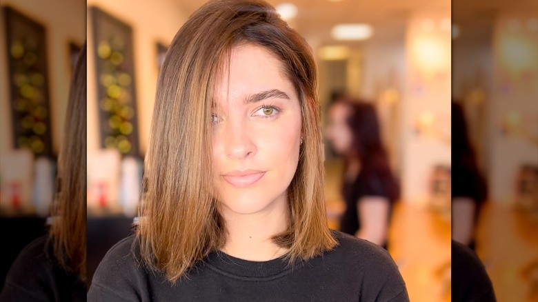 Woman with stretched bob haircut