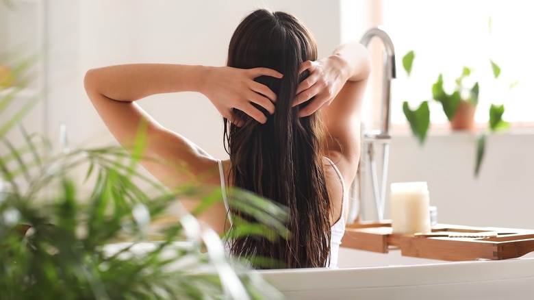 woman massaging hair