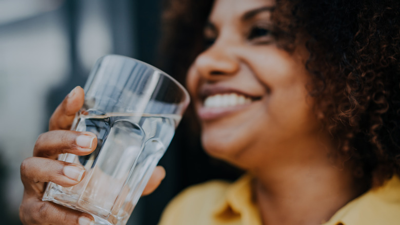 Woman drinking a glass of water