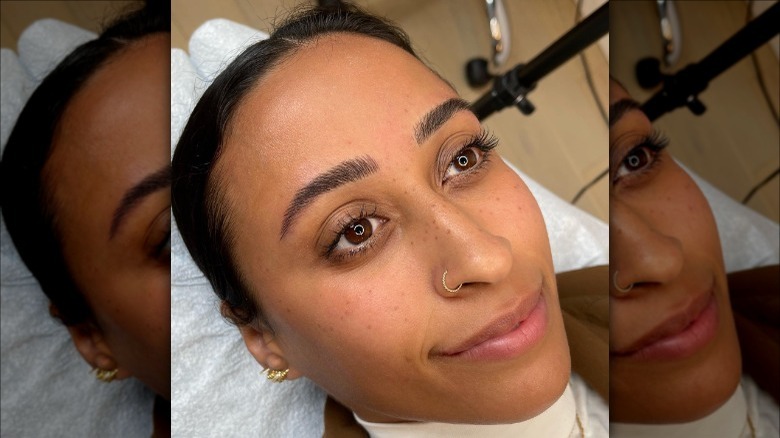 person with freckle tattoos