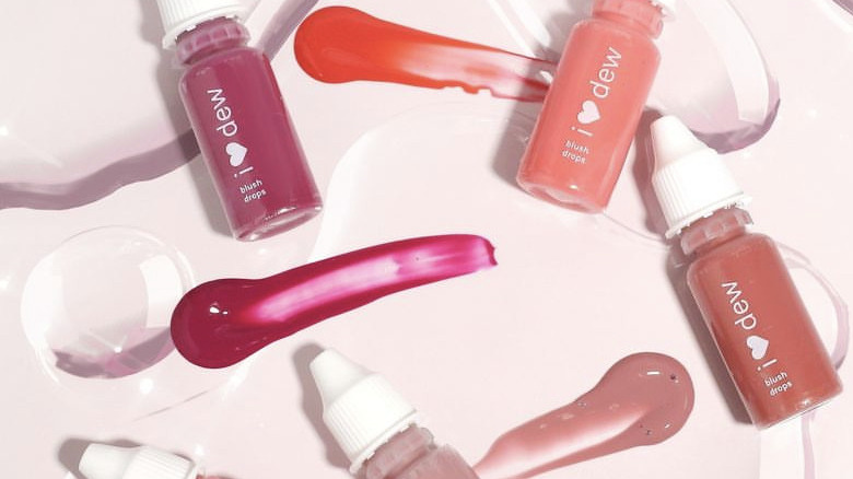 Bottles of different colored blush