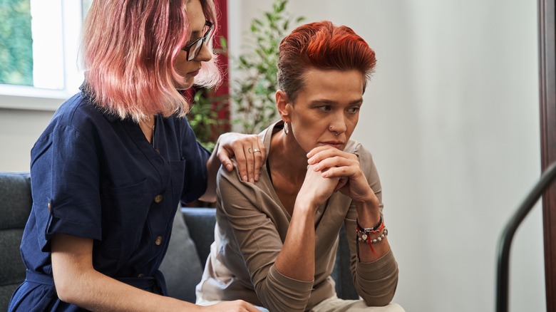 Woman comforting partner