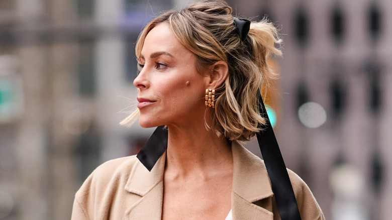 woman with haircut worn half-up