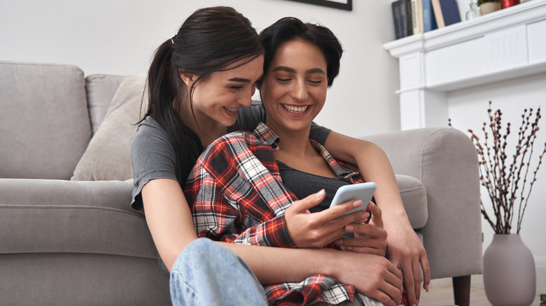 Couple looking at phone