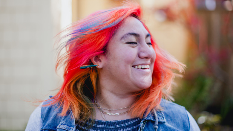 A woman with multicolored hair