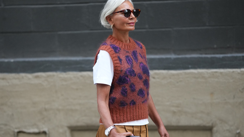 white t-shirt layered with sweater