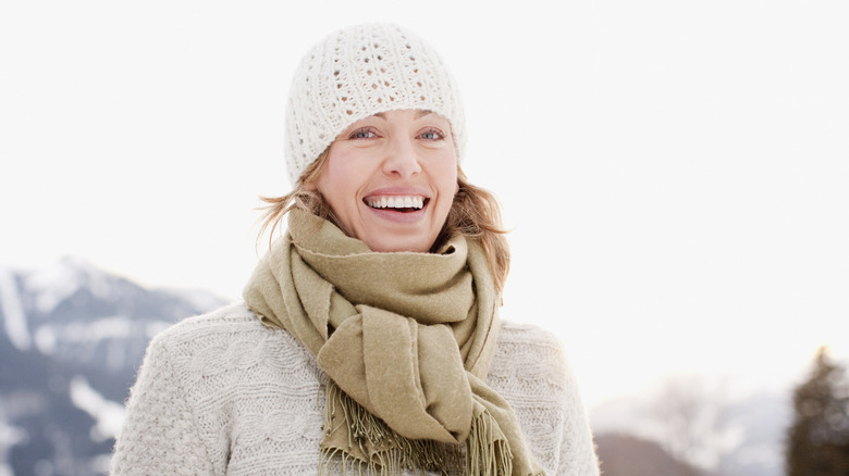 Woman wearing white beanie