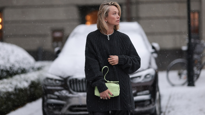 Woman wearing black knitwear 
