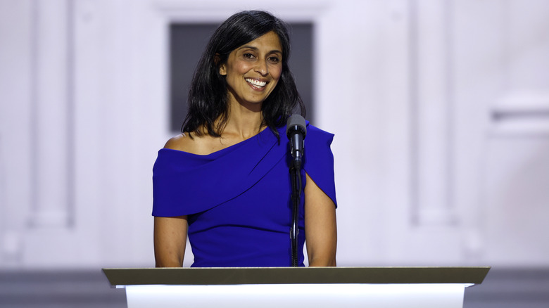 Usha Vance giving a speech in a blue dress