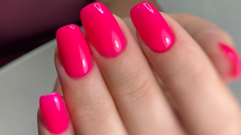 Neon pink nails