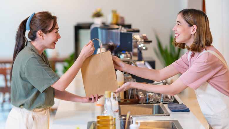 happy coffee shop employee