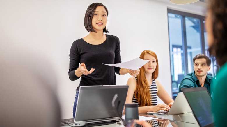 Woman giving work presentation