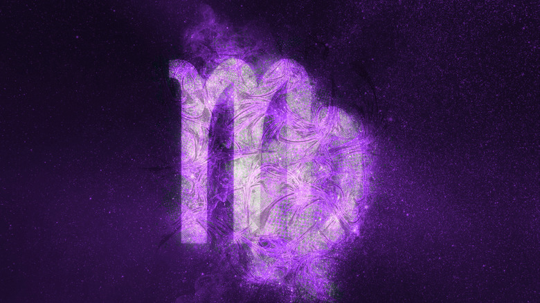 Virgo symbol against the night sky