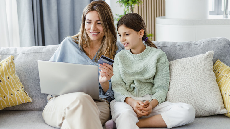 Mom and daughter shopping online