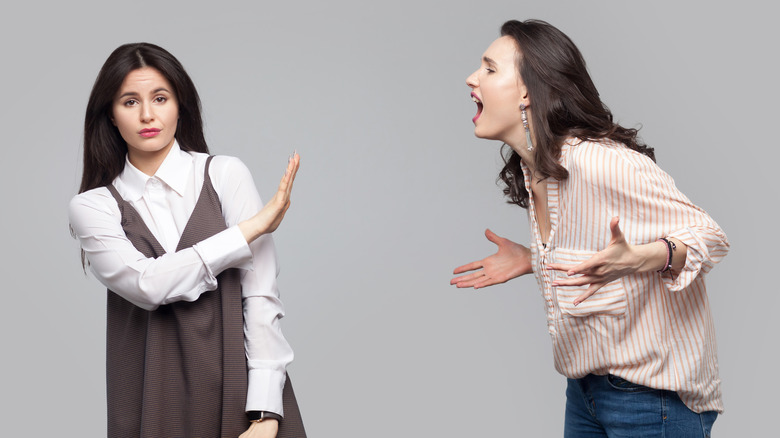 Lady holding her hand up