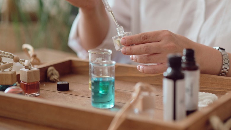 woman creating perfume