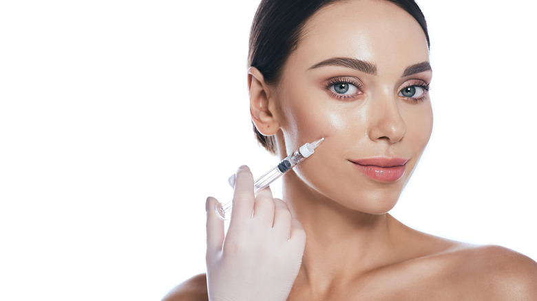 Woman receiving a dermal filler
