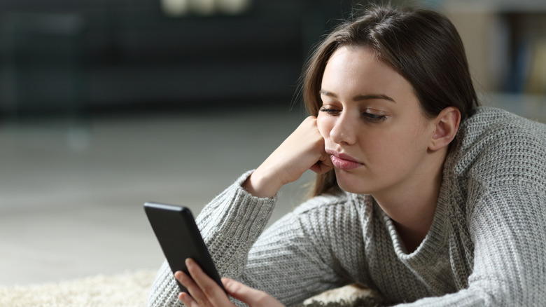 Bored person on the phone