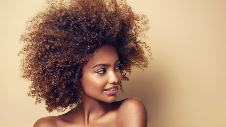 Black woman with naturally curly hair