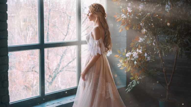 Bride looking out the window