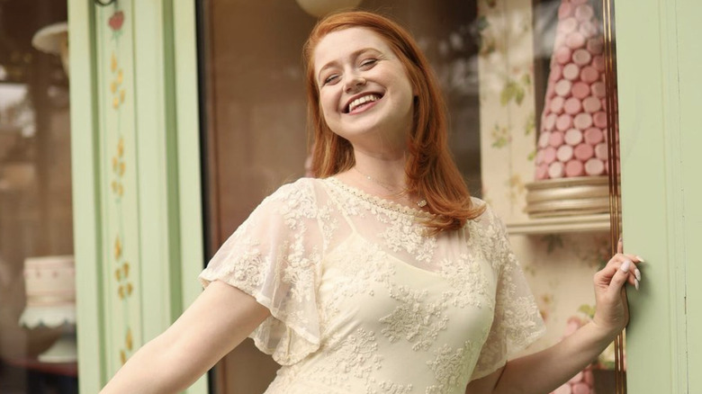 Smiling bride in Unique Vintage dress