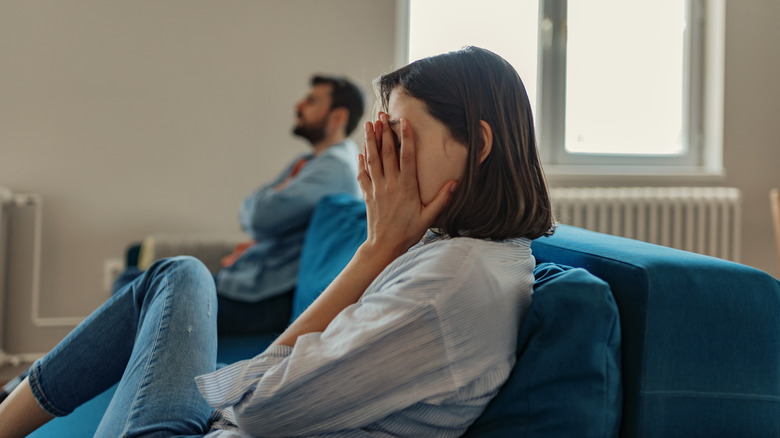 man convincing unsure woman