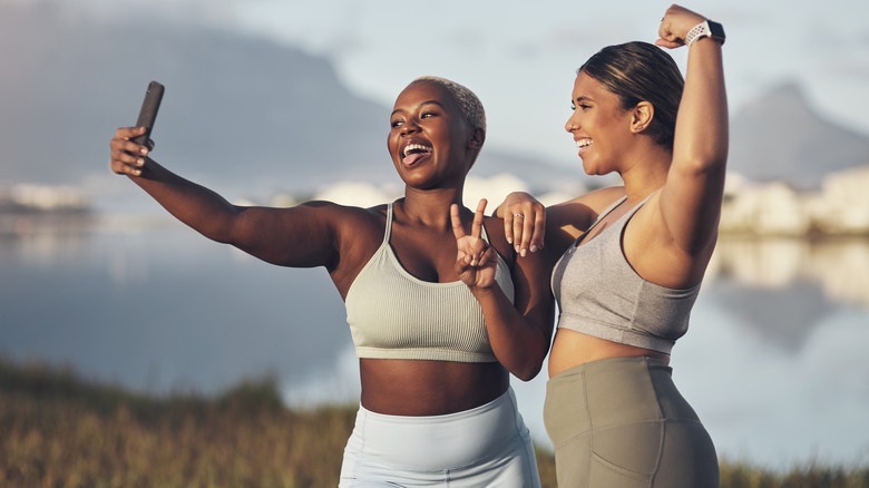 Two athletic women posing for a selfie