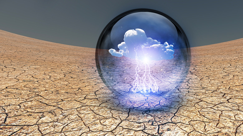 Sphere on dry, cracked earth