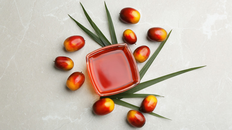 Red palm oil in a glass dish