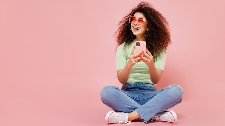 Women sitting on phone