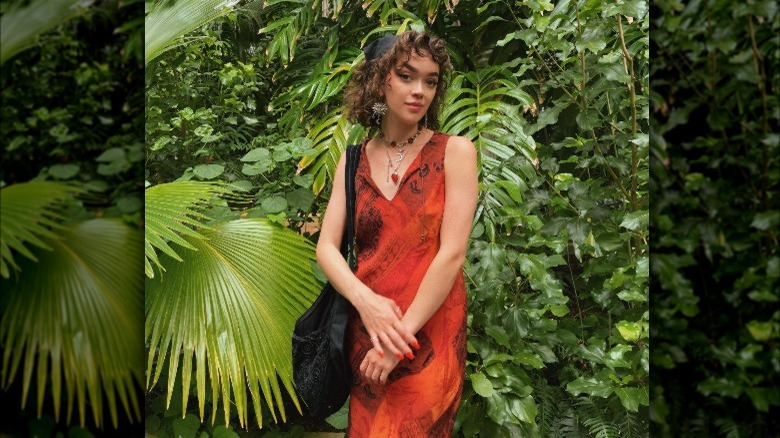 Influencer wears earthy orange dress