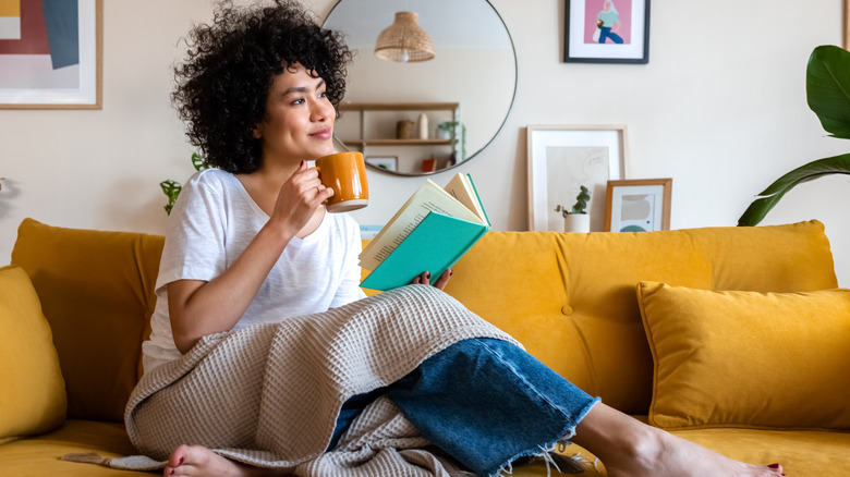 woman relaxing on couch