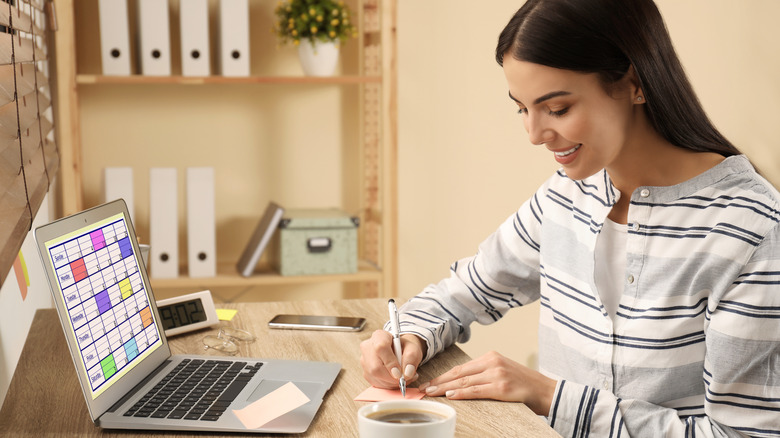 woman creating schedule