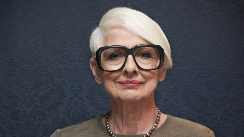 A woman with an asymmetrical bob posing for a picture