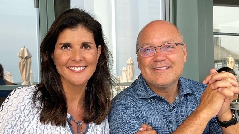 Nikki and Michael Haley sitting outside at a restaurant.
