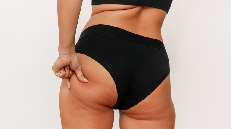 Woman in black undies