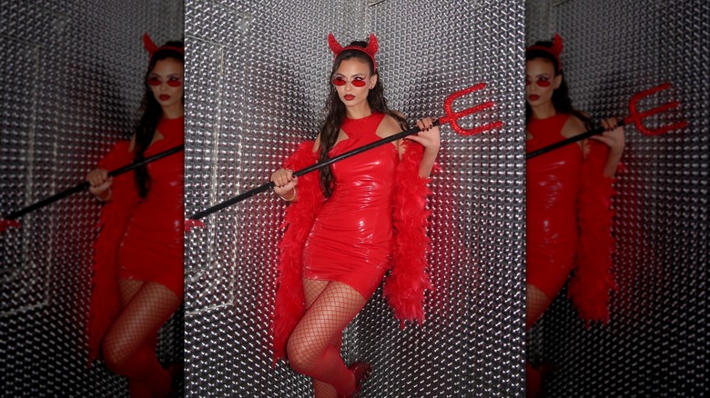 Victoria Justice's 2025 Halloween costume consisting of a red latex devil dress