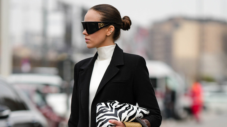 wraparound sunglasses with blazer and turtlneck