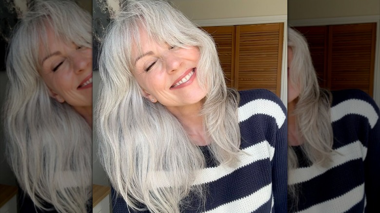 Red hair with curtain bangs