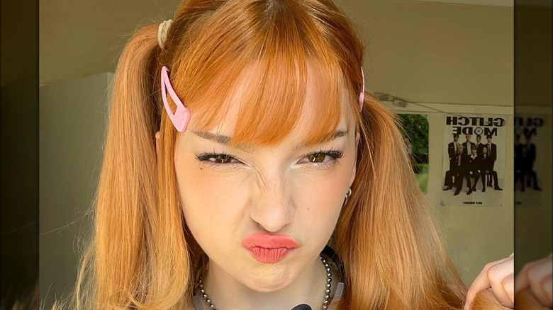 woman wearing barrettes in bangs