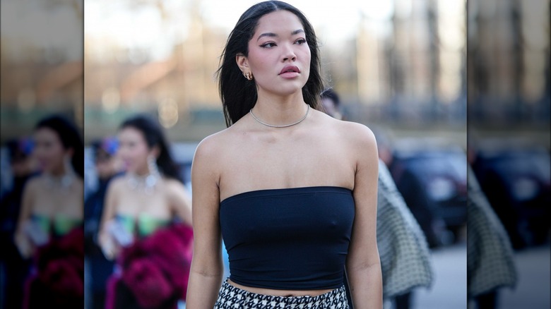 woman in black tube top