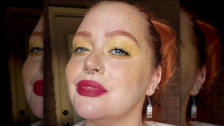 Woman with yellow eyeshadow and blush