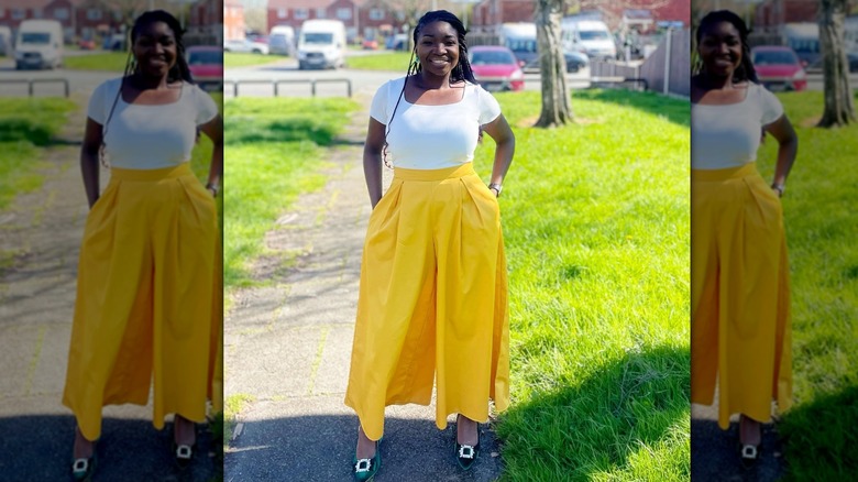 White top and yellow trousers